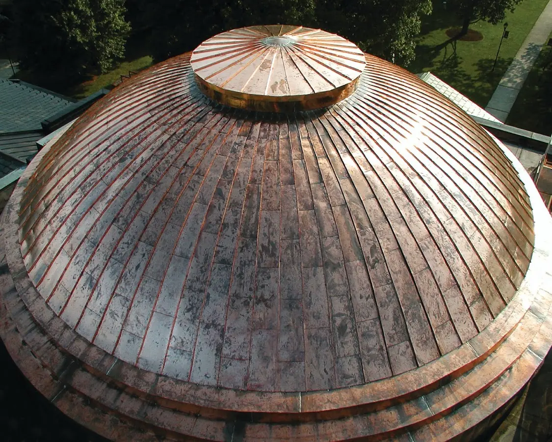 Craftsman Roofing crew installing a new roof in Plandome Manor